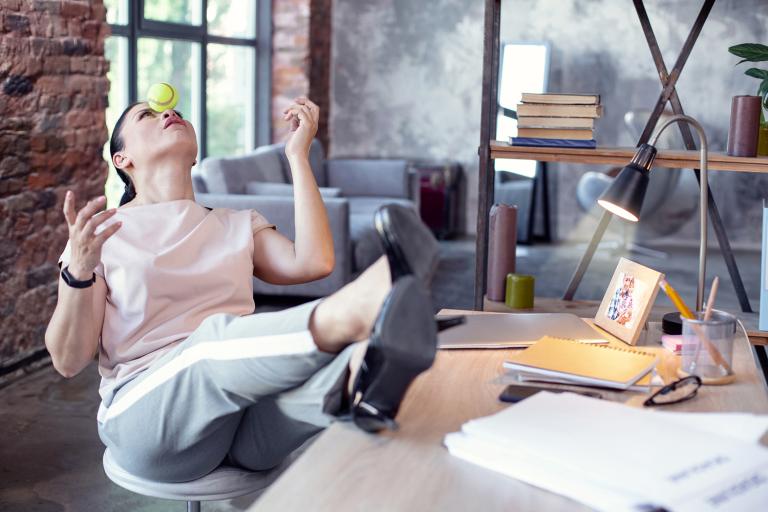 a woman trying to relax in the office