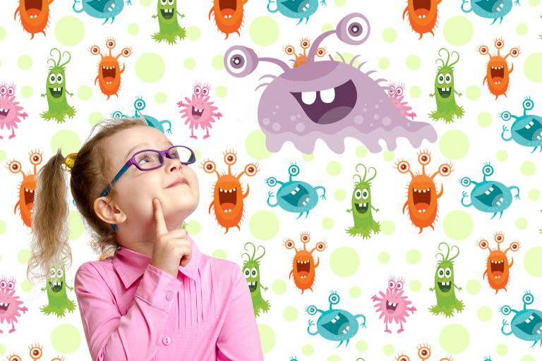 A little girl looking at some friendly "good" bacteria